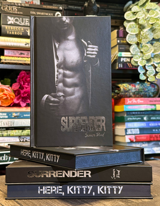 Surrender - hardcover with sprayed edges and SILVER FOIL text cover
